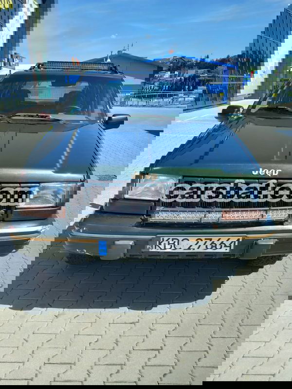 1J4GZB8Y8SC573542 | Green Jeep Grand Cherokee I Gr 5.2 1J4GZB8Y8SC573542 | Green Jeep Grand Cherokee I Gr 5.2