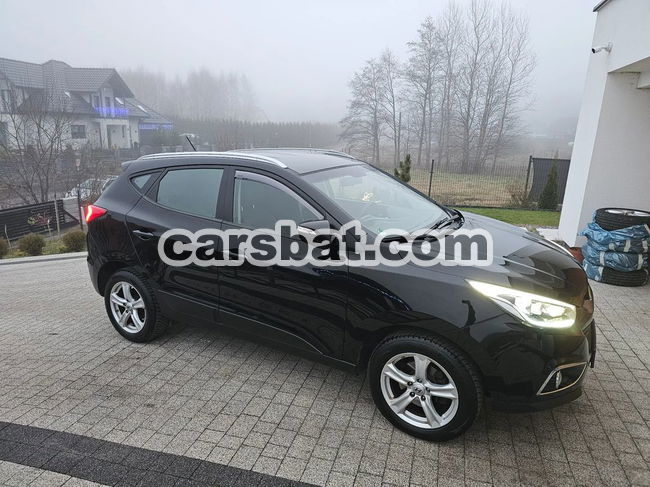 Kia Sportage III 2.0 CRDI 4WD Dream-Team Edition 2013